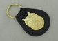 llavero de cuero personalizado NCIS 3D con el emblema del chapado en oro